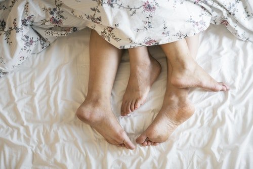 couples feet bed