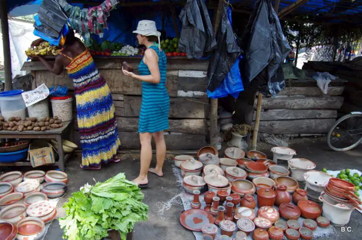 Stocking up on fresh fruit and veggies at a local market in Tanzania.