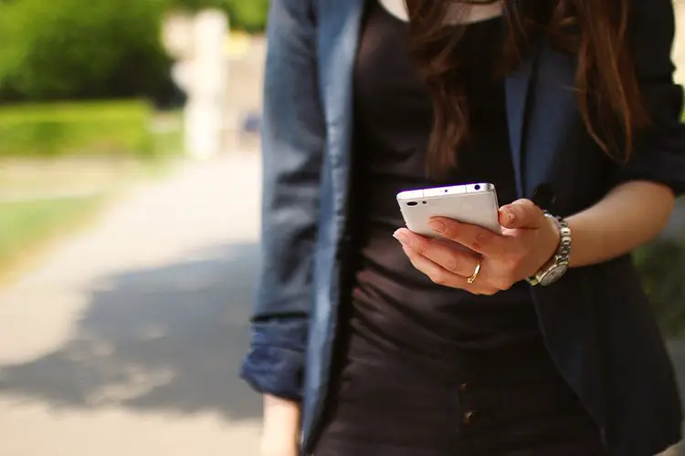 Woman holding a mobile phone