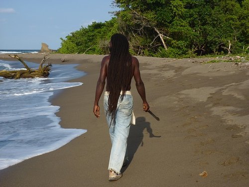 Rastafarian man on beach