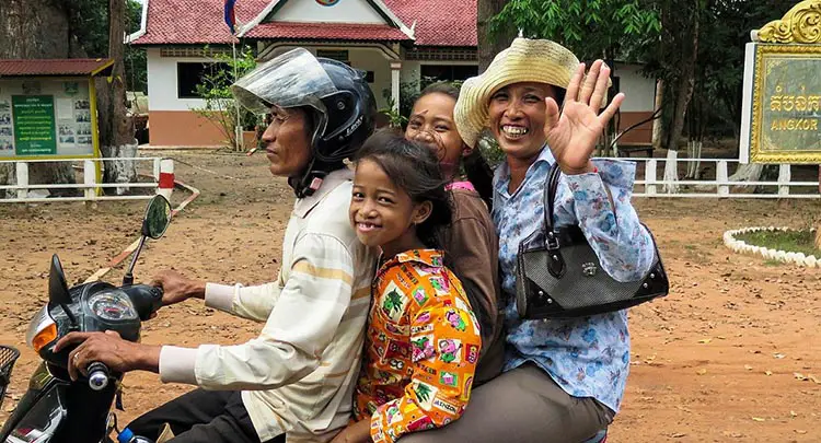 Cambodian family riding a motorcycle