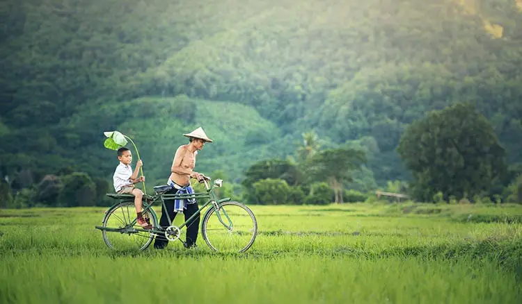 Father and son with a bicycle