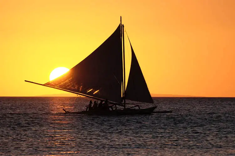 Sailing boat on the sea at the sunset at Boracay island Philippi