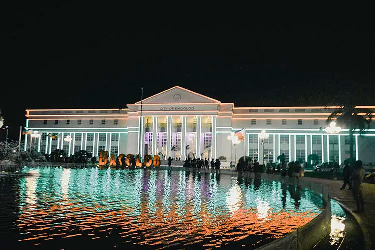 The present City Hall of Bacolod City, Negros Occidental - Local Government Office of Bacolod City with a park fronting the said office.