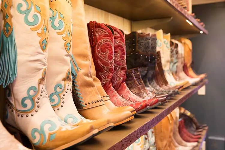 Cowboys boots on a shelf in a store