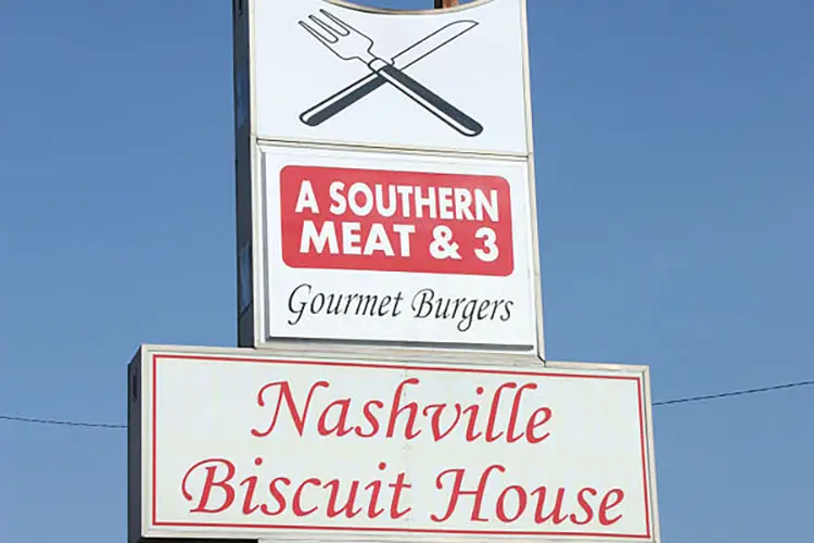 Sign for the Nashville Biscuit House, a "meat and three" restaurant on Gallatin Road in Nashville, Tennessee